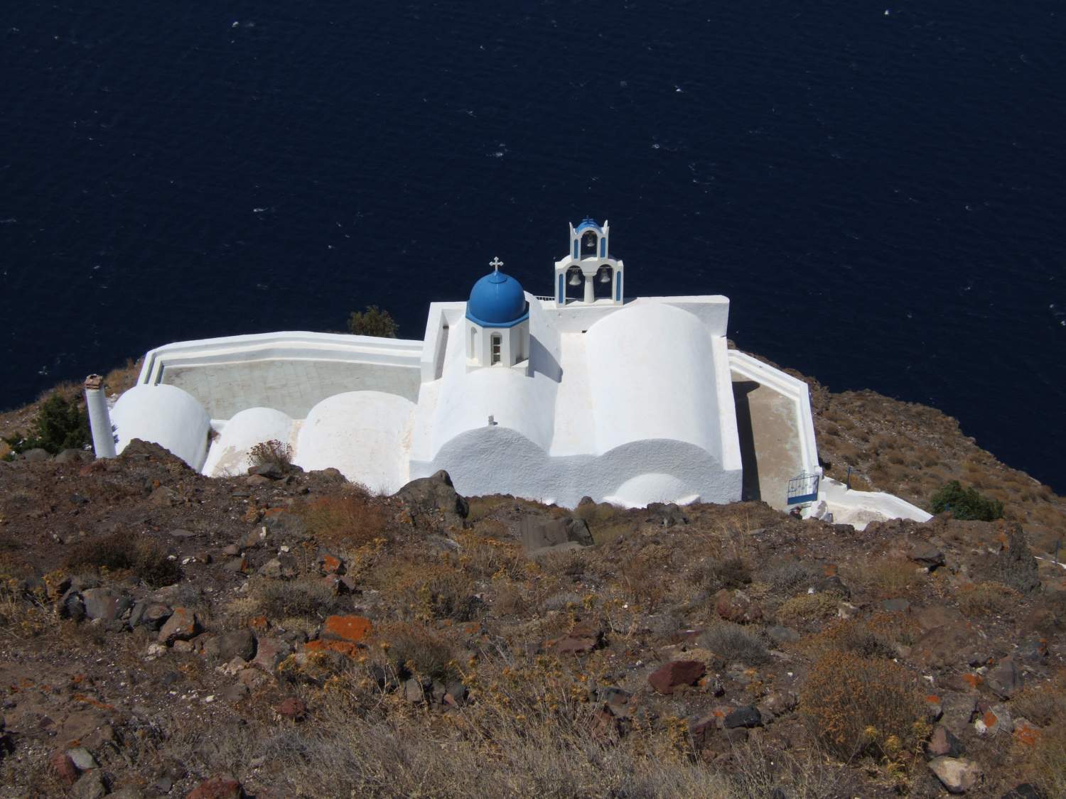 Chapel of Agios Loannis Apokefalistheis over the sea in Santorini, Greece