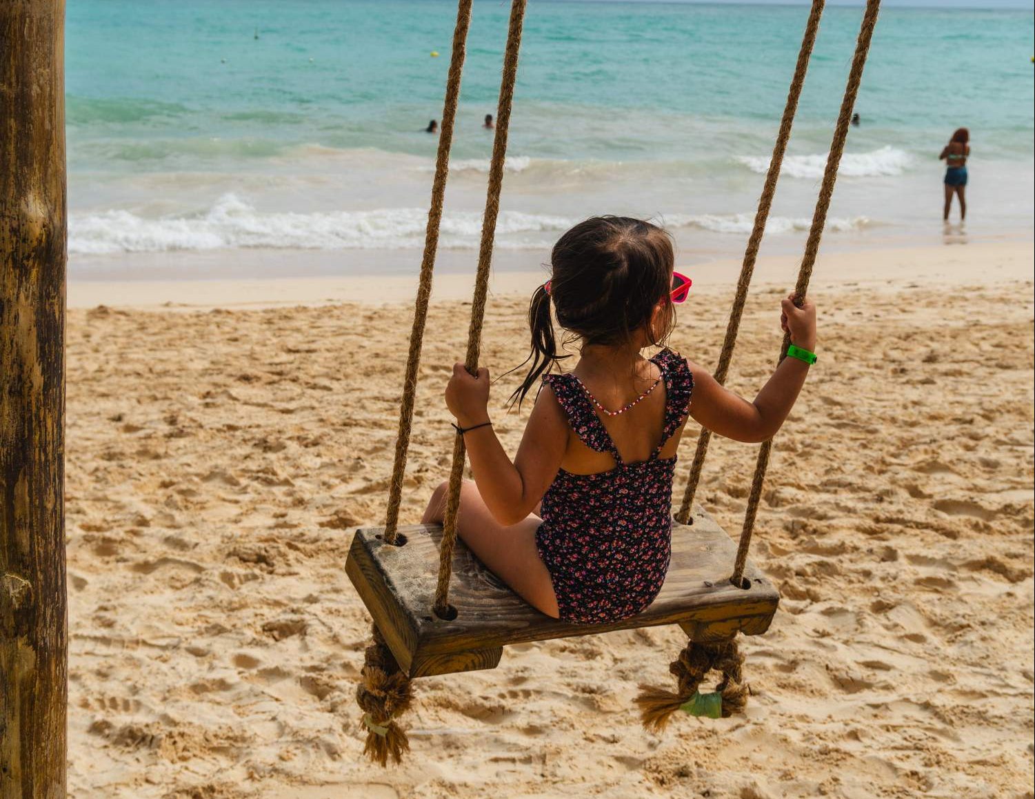 Swinging on the beach in Dominican Republic