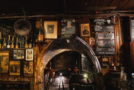 london_uk_bar_wine_old_cave_grotto_newspaper_corky_portraits